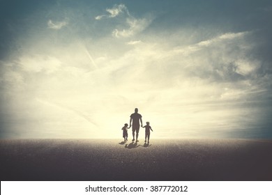 Father Walking With His Two Daughters