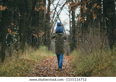 Similar – Young man running outdoors during workout in a forest