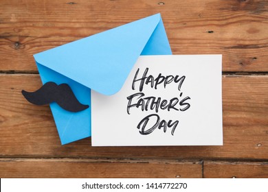 Father's day card and blue envelope with paper mustache - Powered by Shutterstock