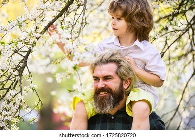 Fathers Day. Dad And Son. Best Dad Ever. Child Having Fun With Dad. Happy Family. Little Boy And Father In Nature Background. Springtime. Hipster Piggybacking Baby. Bearded Brutal Man Good Father.