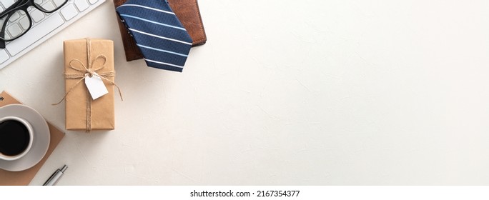 Father's day gift idea background design concept with gift boxdesign concept on office table. - Shutterstock ID 2167354377
