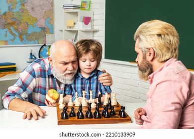 Fathers Day. Grandfather Father And Son, Men Generation. Three Different Generations Ages Grandfather Father And Child Son Playing Chess.