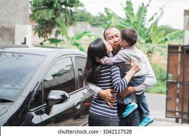 Father's Day. Happy Family Son Running And Hugging Dad After Work