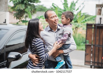 Father's Day. Happy Family Son Running And Hugging Dad After Work