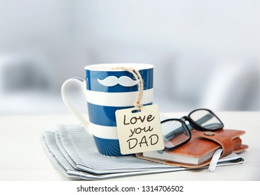 Father's Day Holiday Concept Ojects. Coffee Cup Mug With Message Tag.