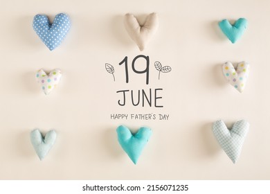 Father's Day Message With Blue Heart Cushions On A White Paper Background