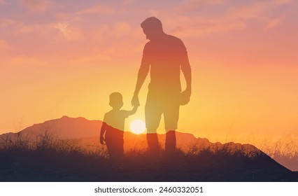 Father's and his son holding hands at sunset field. Dad leading son over summer nature outdoor. Family, trust, protecting, care, parenting concept - Powered by Shutterstock