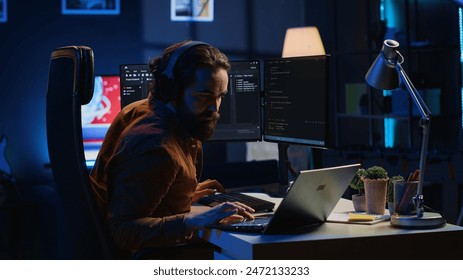 Fatigued developer working overnight at home, rubbing eyes while taking break from coding, feeling sleepy. Tired IT admin exhausted from too much screen time, pausing tasks to rest, camera A