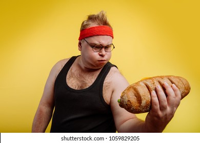 Fatigued Funny Fat Man Sweats While Lifting Burger