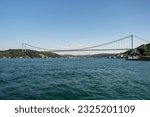 Fatih Sultan Mehmet Bridge and Turkish Flag on the Bosphorus. Istanbul, Turkey. (Fatih Korosu, Fatih Sultan Mehmet Köprüsü)