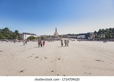 Fatima, Portugal - 07/21/2019: Main Square Of Fatima With Few People, Blue Sky, Horizontal Photo Landscape