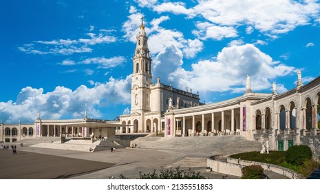 Fatima, Portugal - November 13 2022 - People Passing The Square In Front Of The Basilica Of Our Lady Of The Rosary Of Fatima