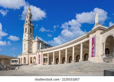 Fatima, Portugal - November 13 2022 - People Passing The Square In Front Of The Basilica Of Our Lady Of The Rosary Of Fatima