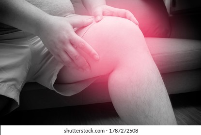Fatty Man Suffering From Pain In Knee, Pain In Overweight, Health Care, Total Knee Replacement. Black And White Tone With Red Spot On Knee