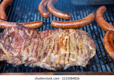 Fatty Steak With Sausauges On Grilled On Grid