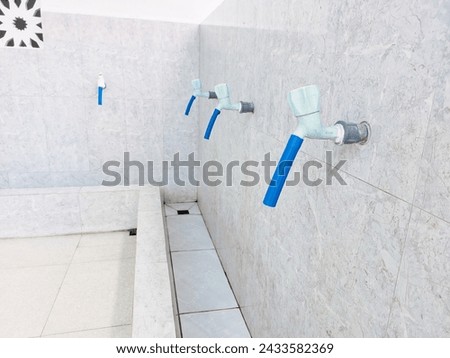 Faucet for ablution, water for purifying oneself for Muslims