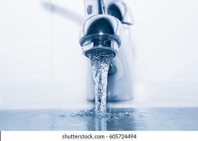 Faucet With Flowing Water Closeup