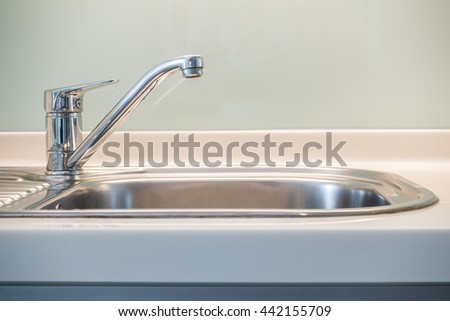 Faucet Sink and water tab decoration in kitchen room interior