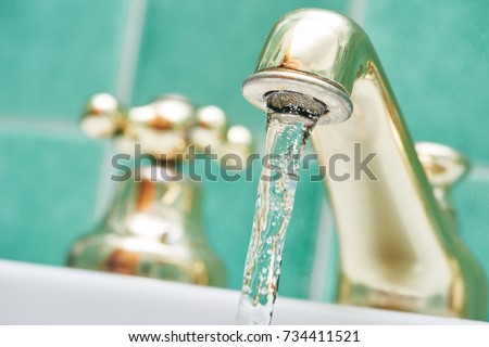 faucet tap with flowing water