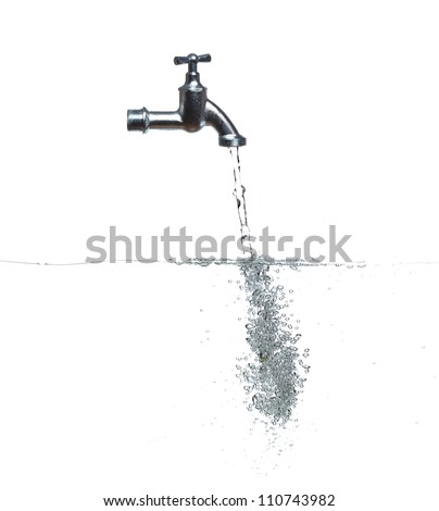 faucet with water and bubbles