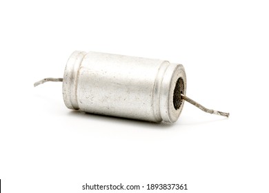 faulty metal-paper capacitors. paper small-sized heat-resistant capacitor. Defective retro capacitors removed for replacement. isolated on white base