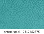 Faux fur, velours turquoise fabric or cloth with wavy effect. Fluffy fabric texture of artificial fur textile material. Canvas background. Decorative fabric for curtain, upholstery, walls, clothes.