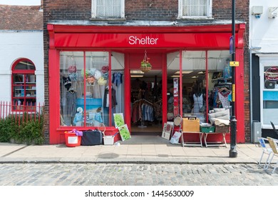 Faversham, Kent, UK - July 9 2019: Shelter Homeless Charity Shop In Pretty, Historic Market Town Of Faversham