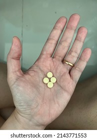 Favipiravir, Yellow Pills In Left Hand Side