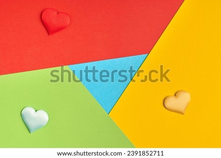 Favorite browser logo from paper. Red, yellow, green and blue colors. Colorful and bright logo with hearts.