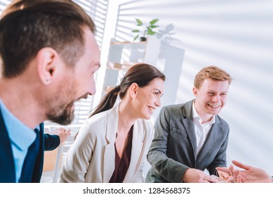 Favourite Job. Nice Happy People Smiling While Being Together At Work