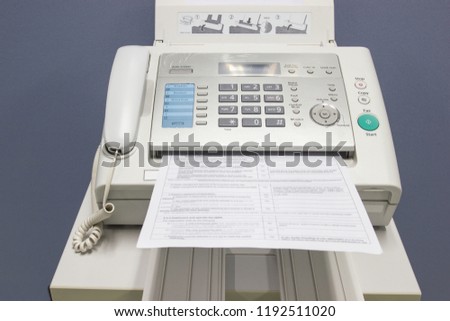 The fax machine for Sending documents in the office concept equipment needed in office