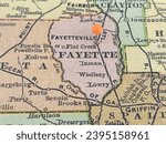 Fayette County, Georgia marked by an orange tack on a colorful vintage map. The county seat is located in the city of Fayetteville, GA.