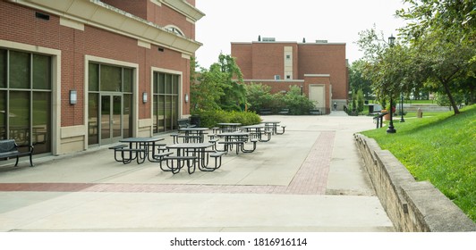 Fayette, MO / United States Of America - September 15th, 2020 : Empty Outdoor Dining Tables At Central Methodist University, Outside Of Student Union Dining Hall On Paved Patio.