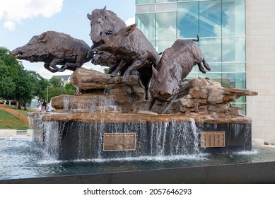 Fayetteville, AR United States Of America - August 19th, 2021 : Wild Razorback Statue And Fountain Near The Entrance To The Donald W Reynolds Razorback Stadium.