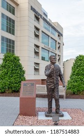 FAYETTEVILLE, AR/USA - JUNE 7, 2018: Coach Frank Broyles Statue On The Campus Of The University Of Arkansas.