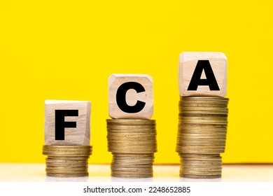 FCA Financial conduct authority word on wooden cube - Shutterstock ID 2248652885