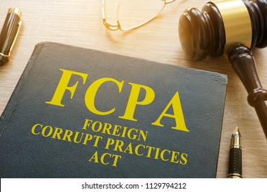 FCPA Foreign Corrupt Practices Act On A Desk.