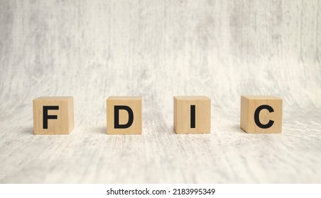 Fdic Word On Wooden Blocks And Wooden Background