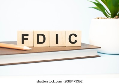 Fdic Word Written On Wooden Cubes With Copy Space