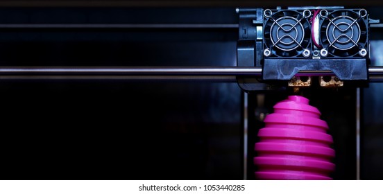 FDM 3D-printer manufacturing wound pink easter egg sculpture - front view on object and print head - panel type composition - background blanked out blurry
