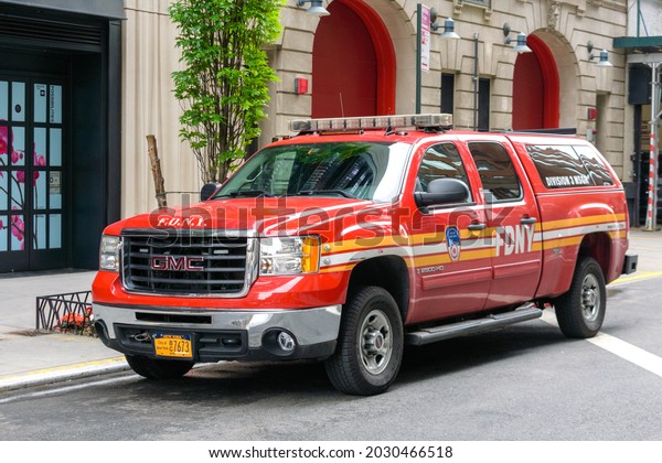 FDNY Division 3 Fire Chief GMC Sierra 2500 HD truck\
vehicle parked near fire department. - Manhattan, New York, USA -\
June, 2021
