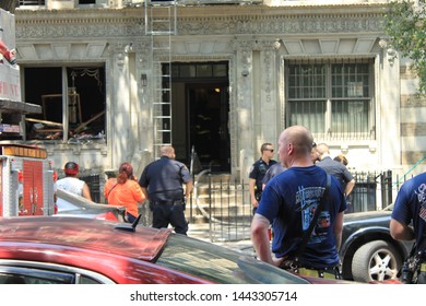 FDNY New York City Fire Department Responding To Fire On Pacific Street In The Crown Heights Section Of Brooklyn With People Outside On A Sunny Summer Day In NY July 3 2019