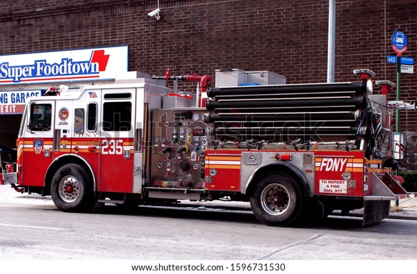 F.D.N.Y New\
York Fire Department Engine 235 From Bedford Stuyvesant at the Food\
town Supermarket located in the crown heights section of Brooklyn\
NY on a winter day December 22\
2019