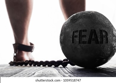 Fear is ball on the leg. Concept of fear. 