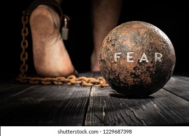 Fear is ball on the leg. Concept of fear.