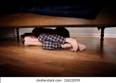 [Image: fearful-boy-hiding-under-bed-260nw-126132929.jpg]
