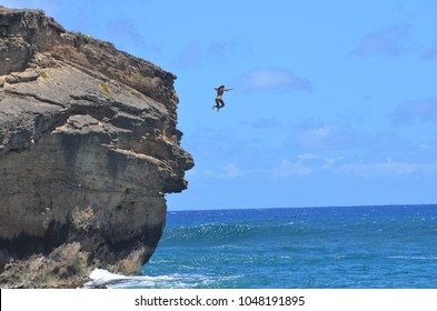 Fearless Woman Jumping Off Cliff