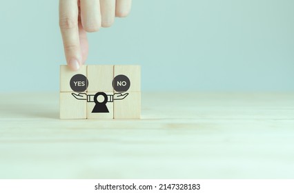 Feasibility study concept. Business management, assessment of the practicality of a proposed project. Go or no go project. Hand placed wooden cubes with yes and no balance on scale on smart background - Shutterstock ID 2147328183