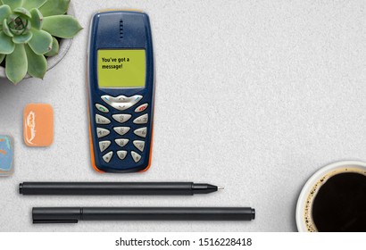 Feature Phone On Grey Paper Background