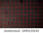 features a grid pattern on a black surface with red lines forming a square grid. There are two small rectangular areas, possibly fixtures or labels, that are part of the grid. The contrast between